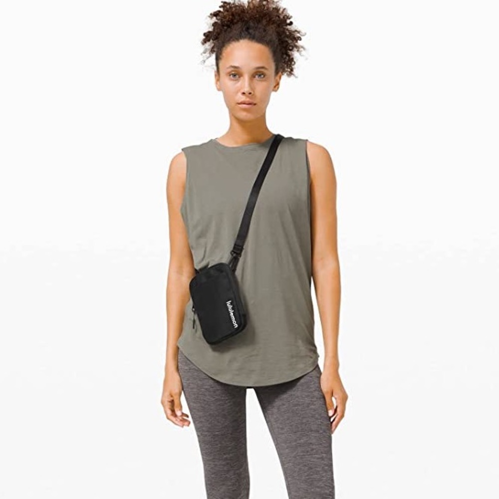 Lululemon Easy Access Black Nylon North South Crossbody Bag.